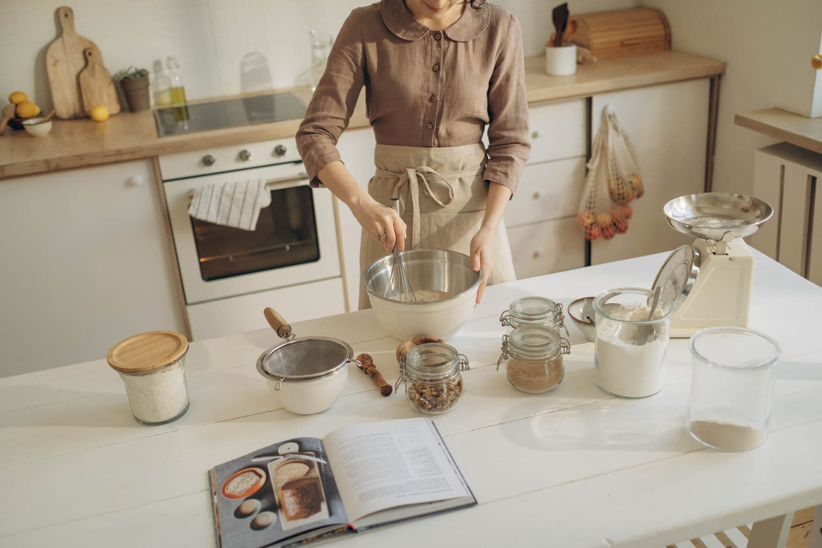 Weighing flour on a kitchen scale — how we work from published specs, not guesswork
